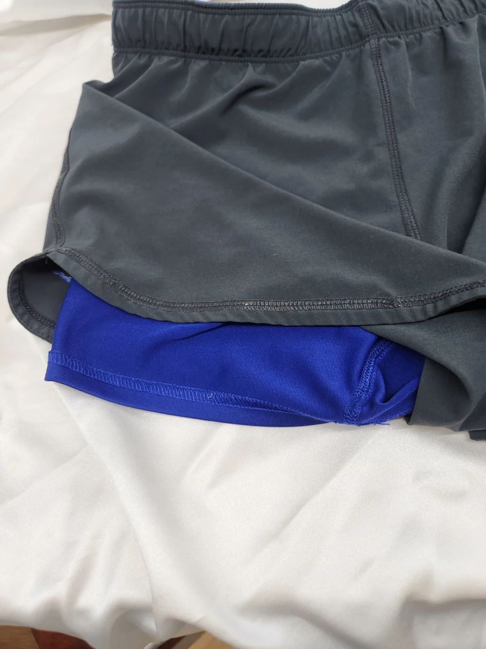 Nike Black Running Shorts with Blue Accent